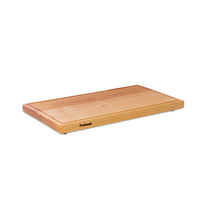 Large maple chopping board by Treeboard, with a juice groove and heartwood grain. These cutting boards are organic.
