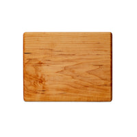 Small maple chopping board by Treeboard. These cutting boards are organic. made of one piece of wood with no glue or petroleum products.