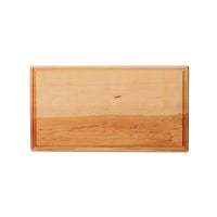 Large maple chopping board by Treeboard with juice groove, top view. These cutting boards are organic. made of one piece of wood with no glue or petroleum products.