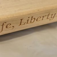 250th U.S.A. anniversary special maple cutting board by Treeboard with quotation from the Declaration of Independence: "Life, Liberty and the pursuit of Happiness."