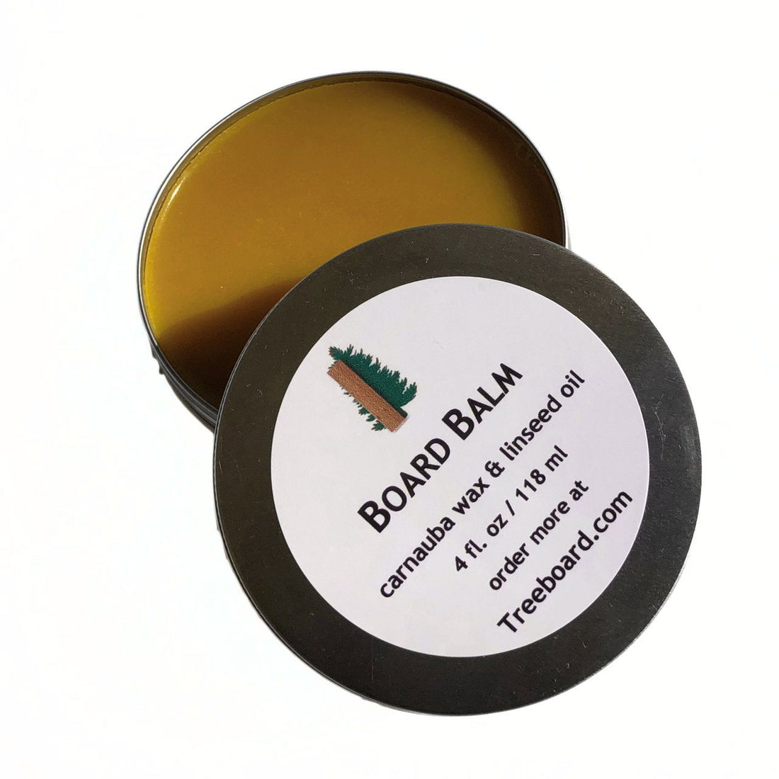 Board balm or wood wax by Treeboard, used for sealing moisture out of cutting boards, wooden spoons or for finishing any wooden surface. Some even use it for hand moisturizer or frizzy hair. The wax is made from carnauba wax and food-grade raw linseed oil, with no mineral oil or non-plant-based substances.