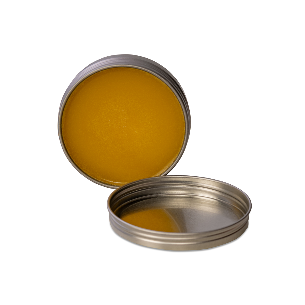 Organic board balm by Treeboard, in a tin. Made from organic carnauba wax and raw organic linseed (flaxseed) oil, cold pressed. Plant-based.