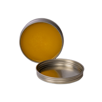 Organic board balm by Treeboard, in a tin. Made from organic carnauba wax and raw organic linseed (flaxseed) oil, cold pressed. Plant-based.