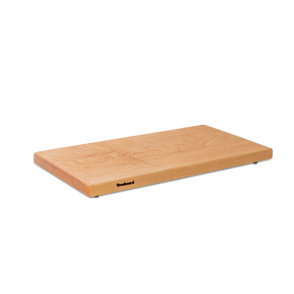 Large maple chopping board by Treeboard. These cutting boards are organic, all one piece and with a plant-based finish.