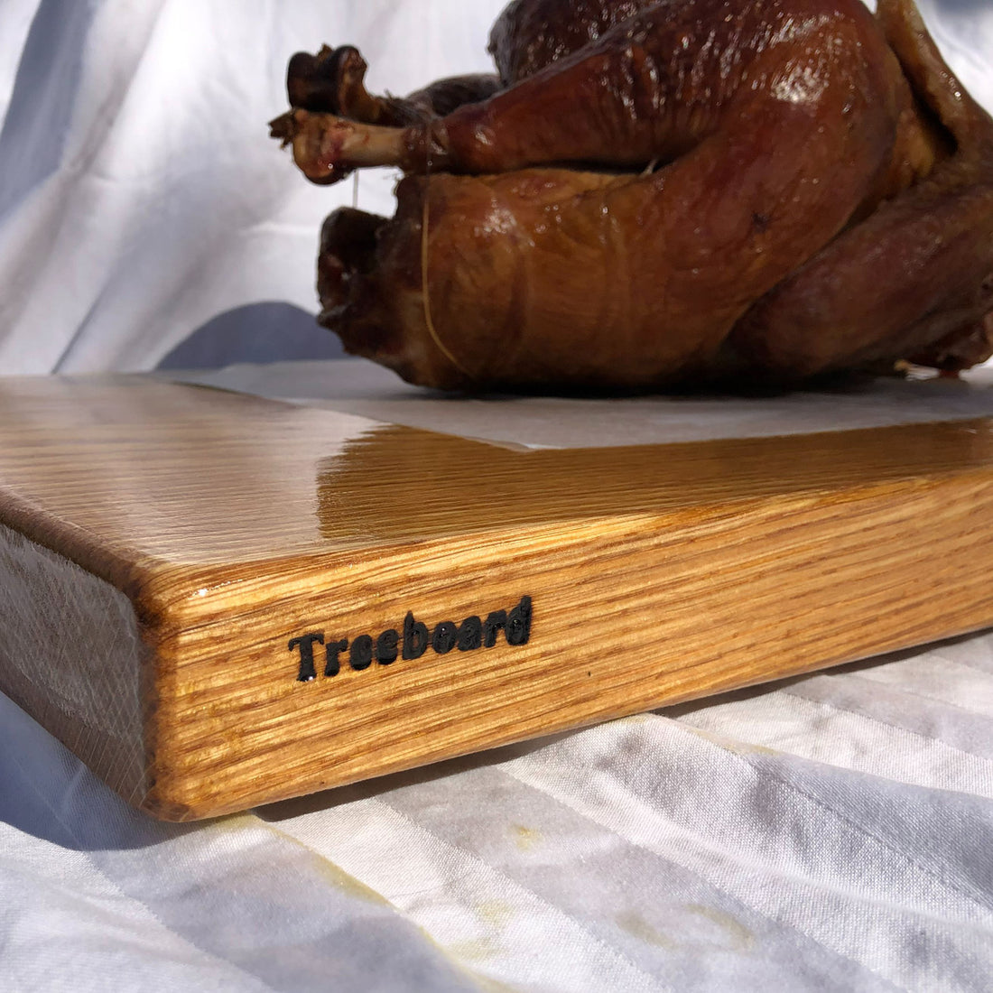 Treeboard large white oak cutting board with a turkey.