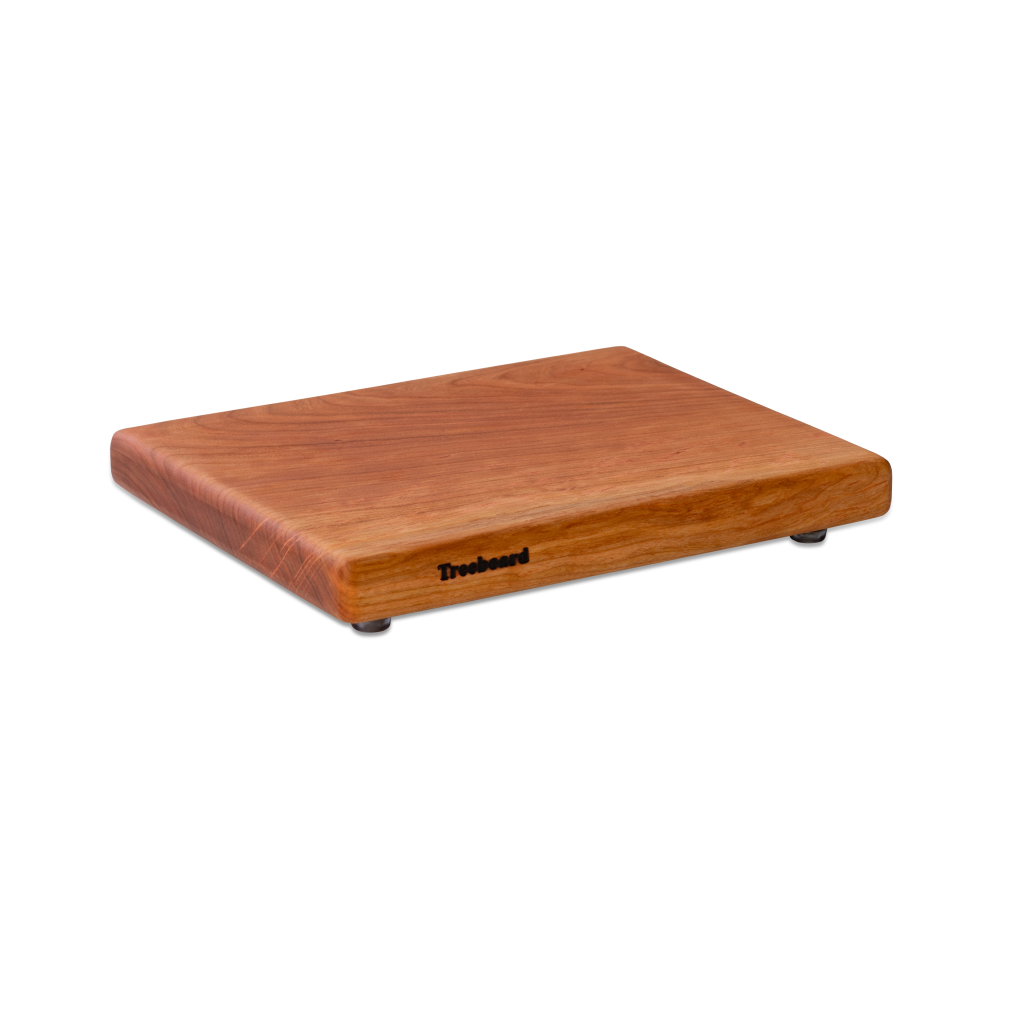 Medium cherry chopping board by Treeboard. These cutting boards are organic, made of one piece of wood with no glue or petroleum products.