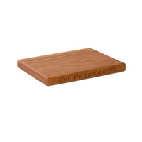 Medium oak chopping board by Treeboard with engraving "She's got a knife."