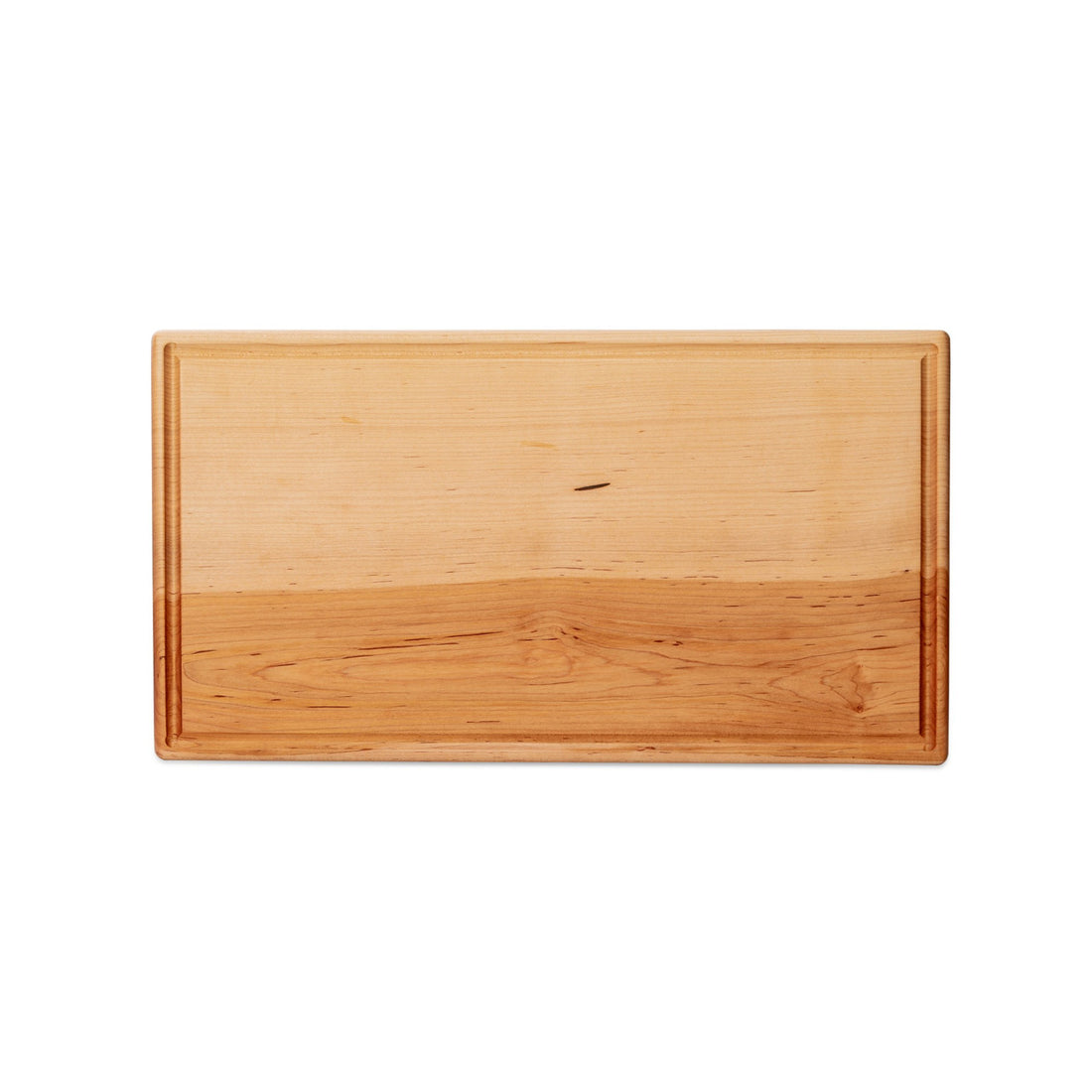 Large maple chopping board by Treeboard with juice groove, top view. These cutting boards are organic. made of one piece of wood with no glue or petroleum products.