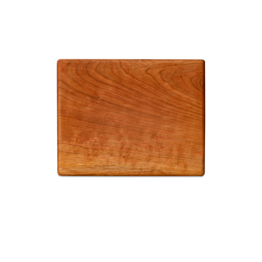 Medium cherry chopping board by Treeboard. These cutting boards are organic, made of one piece of wood with no glue or petroleum products.