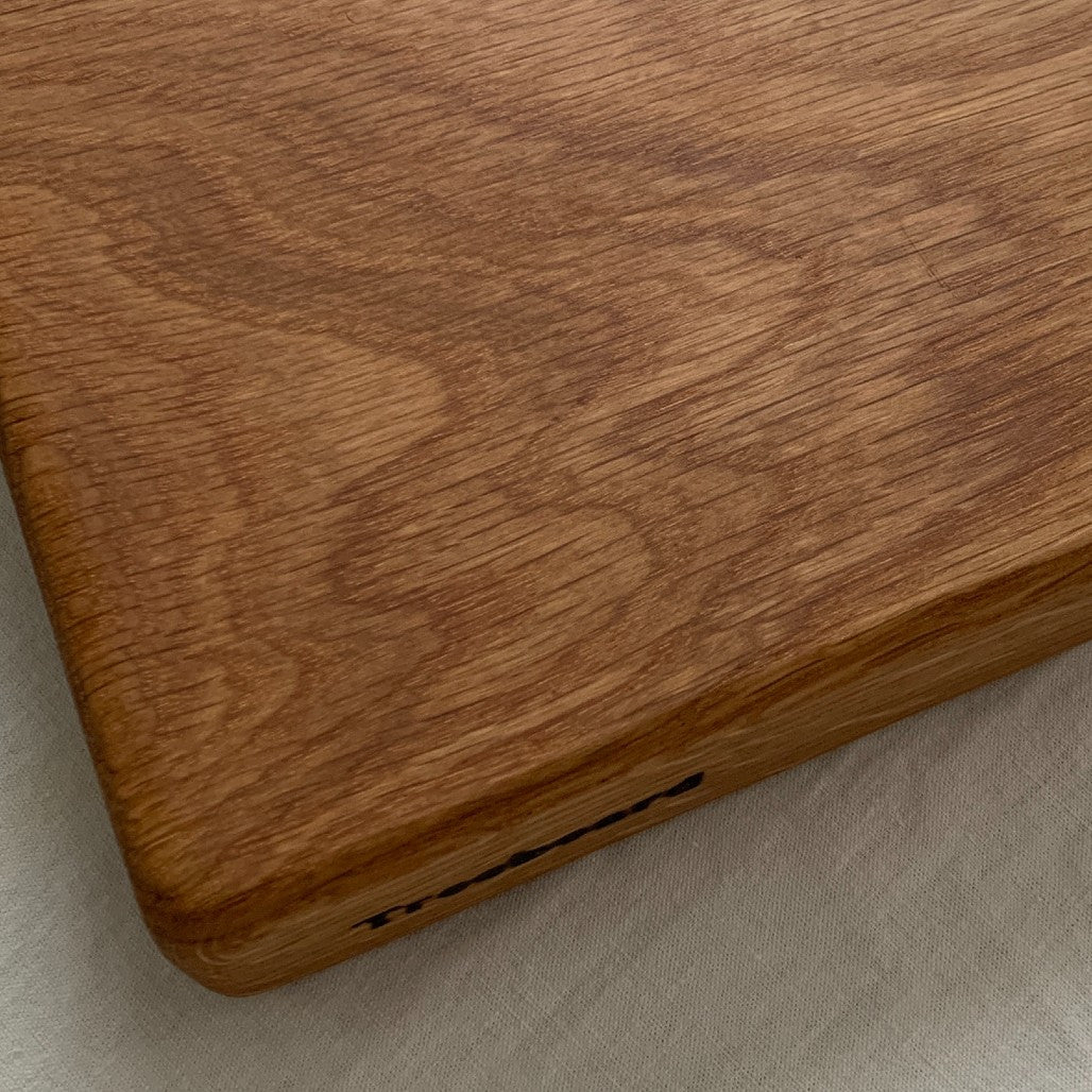 Small white oak cutting board by Treeboard, grain detail.