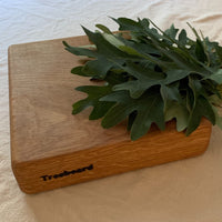 Small white oak cutting board by Treeboard with white oak leaves. Quercus alba.