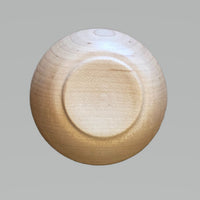Small maple bowl (spice bowl or salt cellar) by Treebord showing the bottom (foot).
