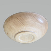 Small maple bowl (spice bowl or salt cellar) by Treebord showing the bottom (foot).