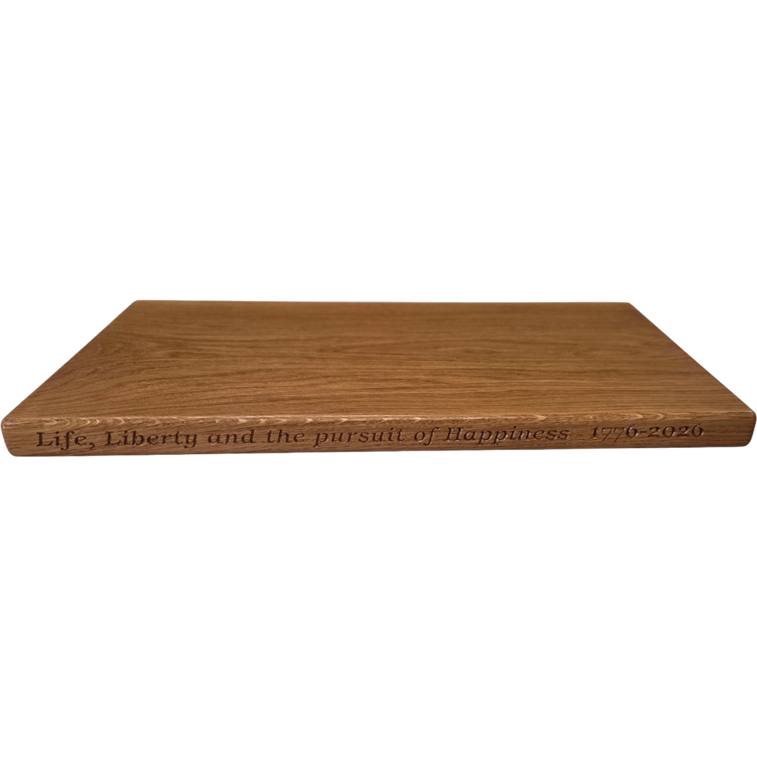 250th U.S.A. anniversary special white oak cutting board by Treeboard with quotation from the Declaration of Independence: "Life, Liberty and the pursuit of Happiness."