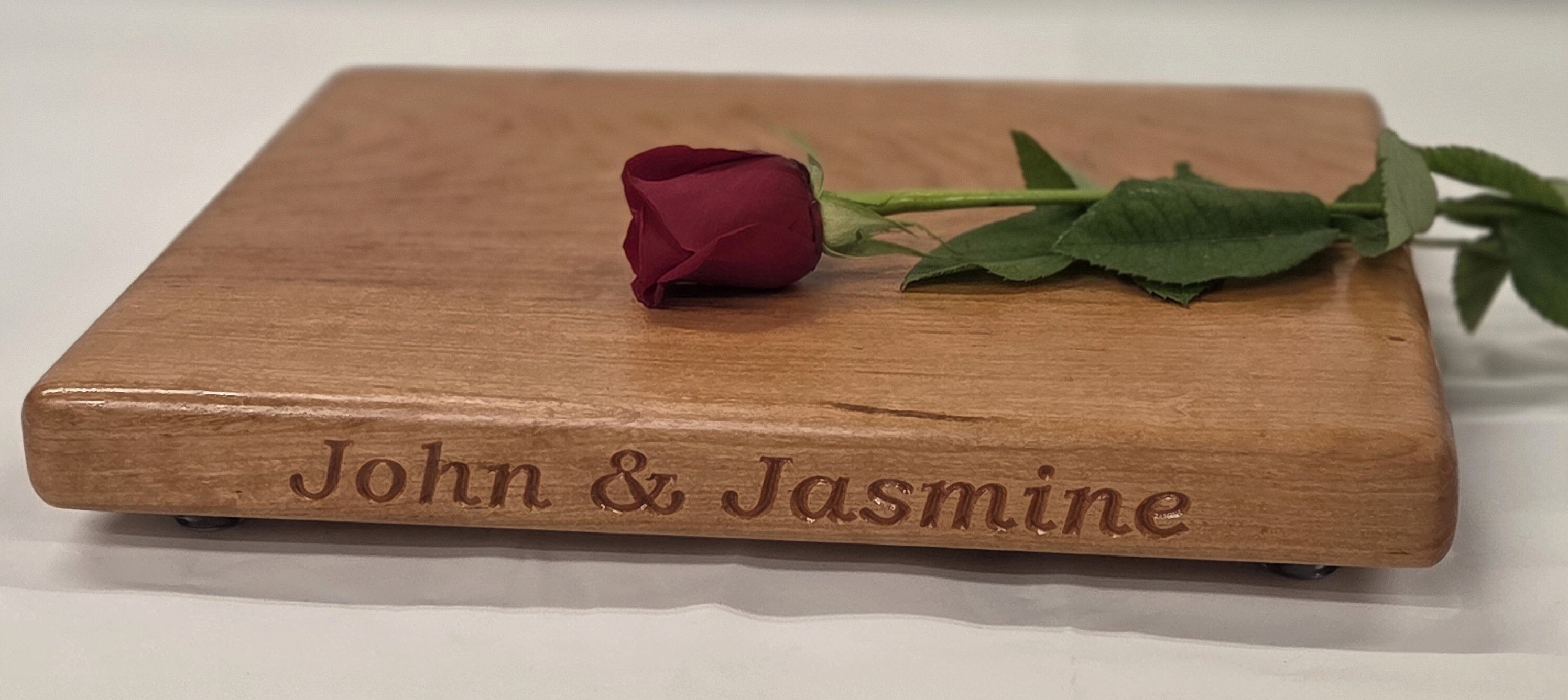 Engraved Medium Cherry Board cherry cutting board by Treeboard engraved with "John & Jasmine"