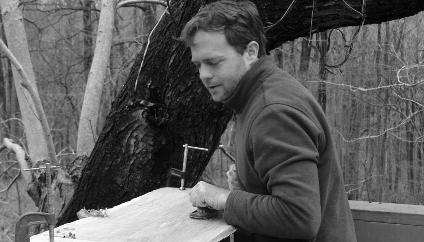 Will  Mauldin of Treeboard planing wood with a maple tree